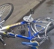 В городе Новомичуринск  женщина  на велосипеде осталась под машиной